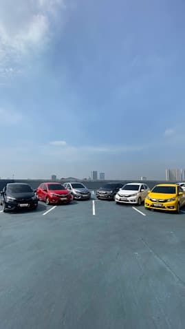 parking lot with a variety of vehicles