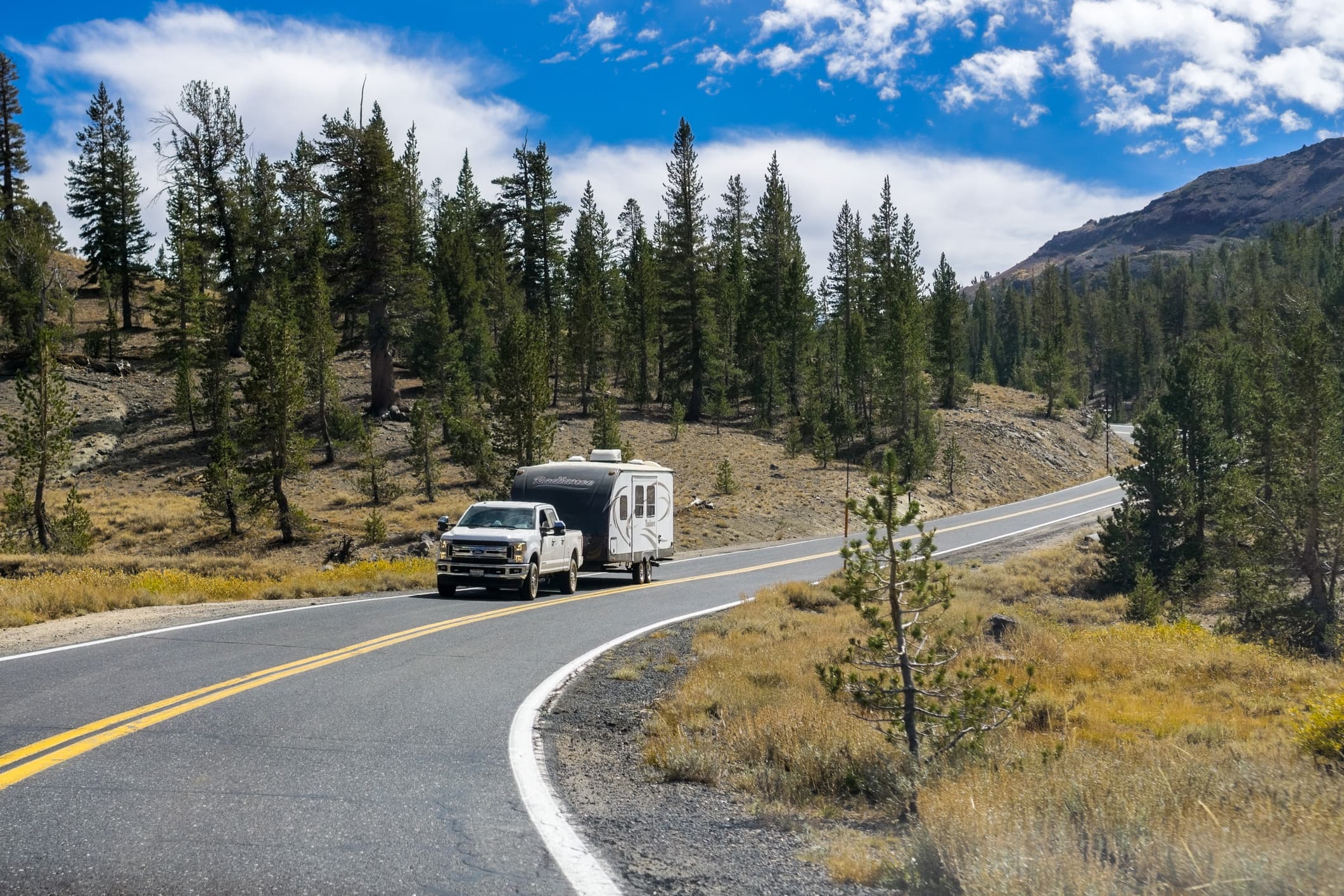 Benefits & Flexibility - RV on scenic road
